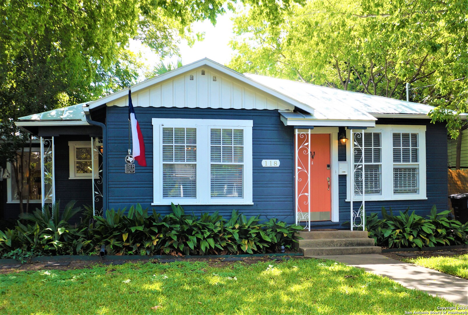 118 Callaghan Avenue San Antonio, TX 78210 - Photo 1 of 1 a front view of a house with a yard