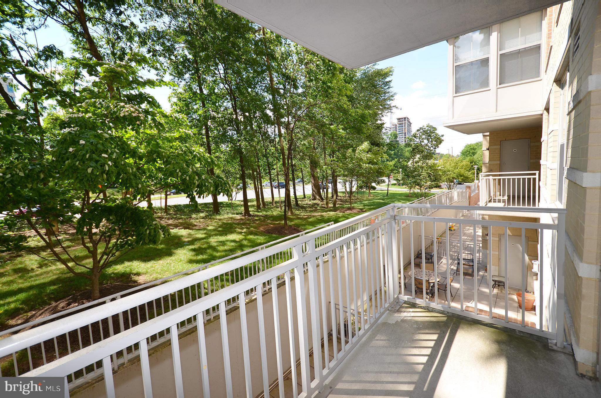 11800 Sunset Hills Road, Unit 210 Reston, VA 20190 - Photo 15 of 30 a view of a balcony with wooden floor