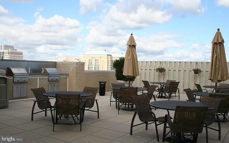 11800 Sunset Hills Road, Unit 210 Reston, VA 20190 - Photo 26 of 30 a view of an outside dining space with furniture