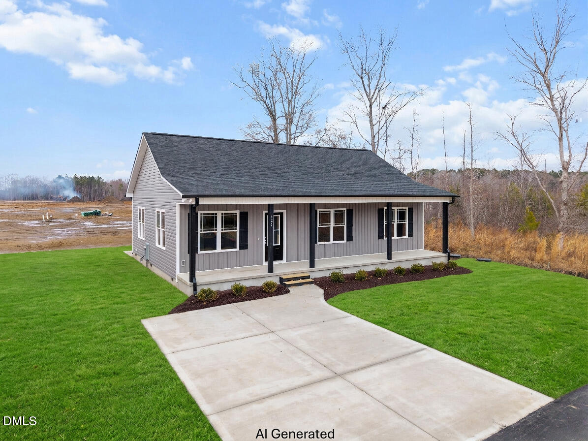 926 Micro Road West Selma, NC 27576 - Photo 4 of 41 a view of a house with a yard and sitting area