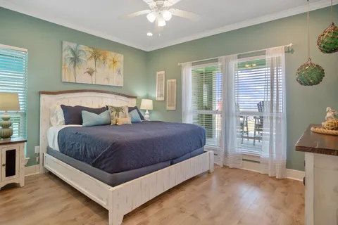 a bedroom with a bed and a lamp