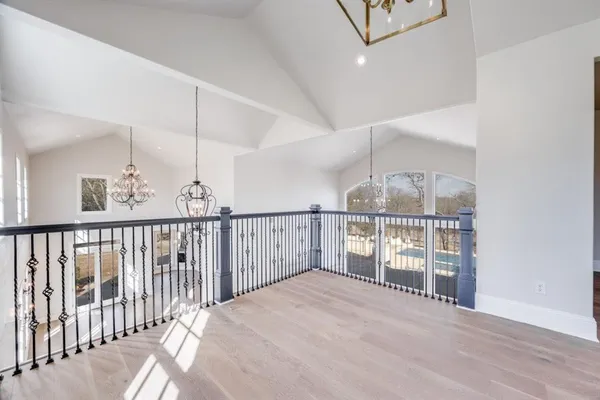 a kitchen with stainless steel appliances granite countertop a sink and cabinets
