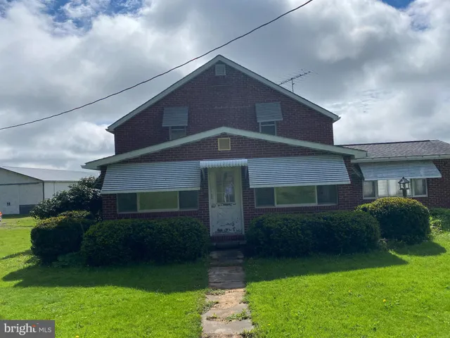 a house view with a outdoor space