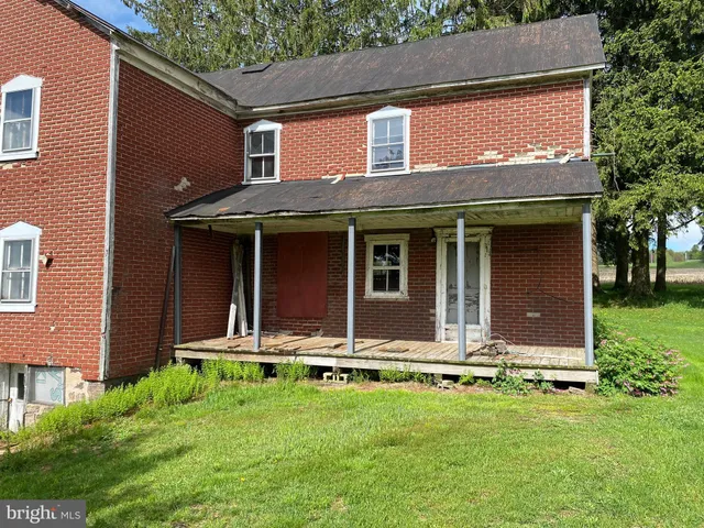 a room with furniture and a window