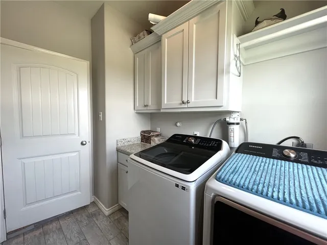 a kitchen with a stove and a cabinet