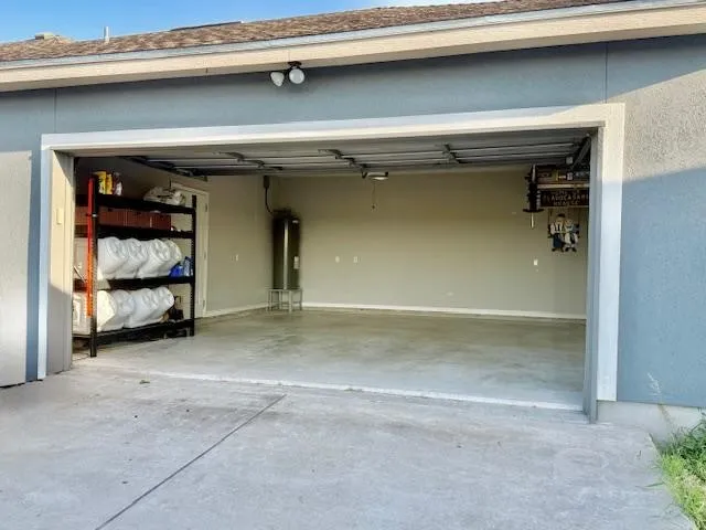 a view of room with a flat screen tv