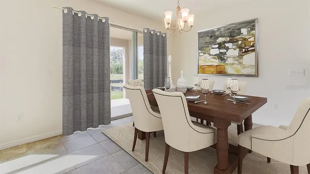 a view of a dining room with furniture and chandelier
