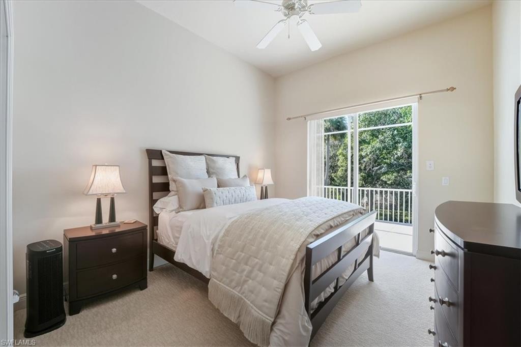560 Inlet Drive Marco Island, FL 34145 - Photo 21 of 32 Carpeted bedroom featuring access to exterior and a ceiling fan