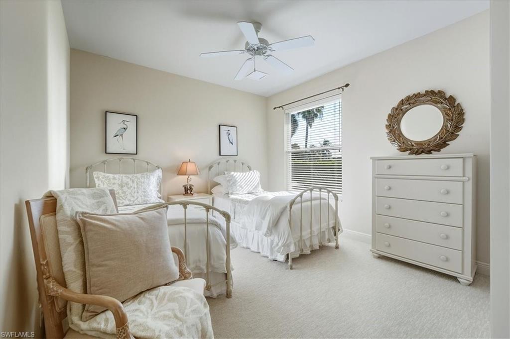 560 Inlet Drive Marco Island, FL 34145 - Photo 23 of 32 Carpeted bedroom featuring ceiling fan and baseboards