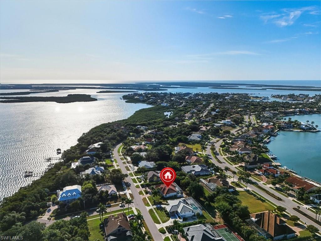 560 Inlet Drive Marco Island, FL 34145 - Photo 31 of 32 Home centered between Roberts Bay and Barfield Bay - Aerial overview of property's location featuring nearby suburban area and a nearby body of water