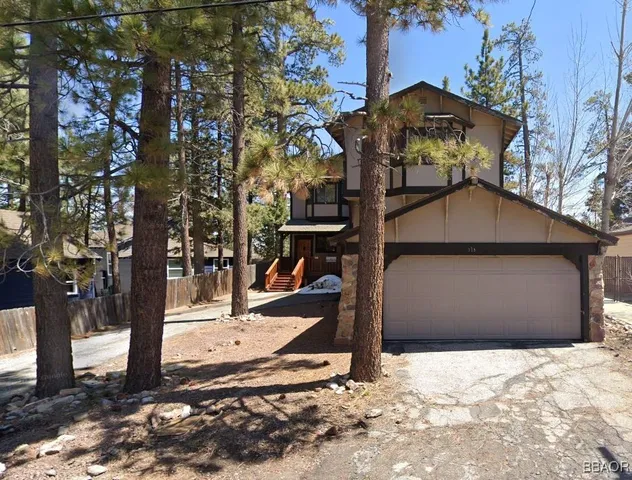 a view of a house with snow