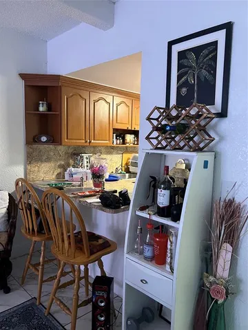 a view of entryway with livingroom