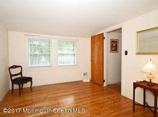 1122 Springfield Avenue New Providence, NJ 07974 - Photo 25 of 28 a view of a livingroom with lounge chair and a window
