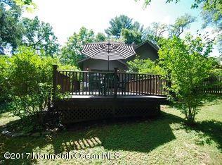 1122 Springfield Avenue New Providence, NJ 07974 - Photo 6 of 28 a view of a garden with a deck