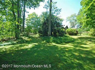 1122 Springfield Avenue New Providence, NJ 07974 - Photo 8 of 28 a view of grassy field with trees