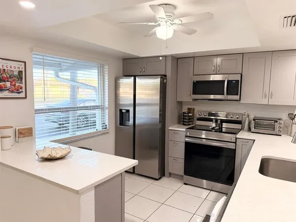 $1,550 | 5027 Southwest 16th Place, Unit 102, Cape Coral, FL 33914