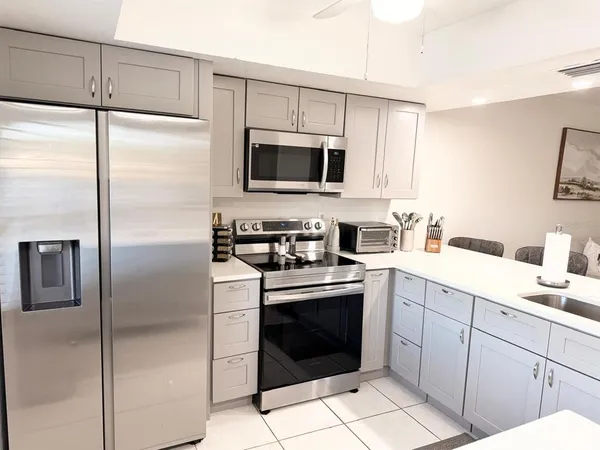 $1,550 | 5027 Southwest 16th Place, Unit 102, Cape Coral, FL 33914