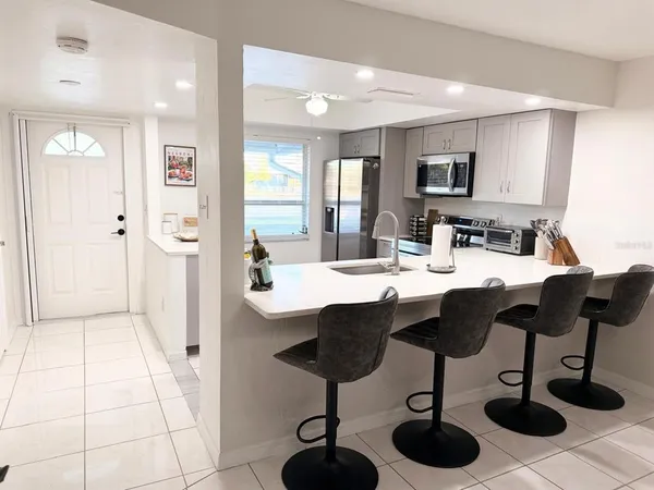 $1,550 | 5027 Southwest 16th Place, Unit 102, Cape Coral, FL 33914