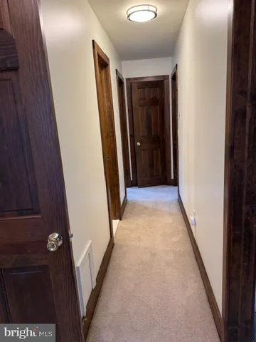 a view of hallway with stairs