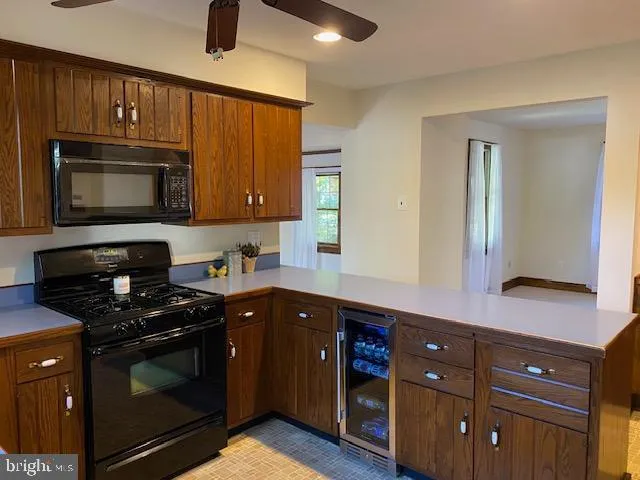 a view of entryway with wooden floor and door