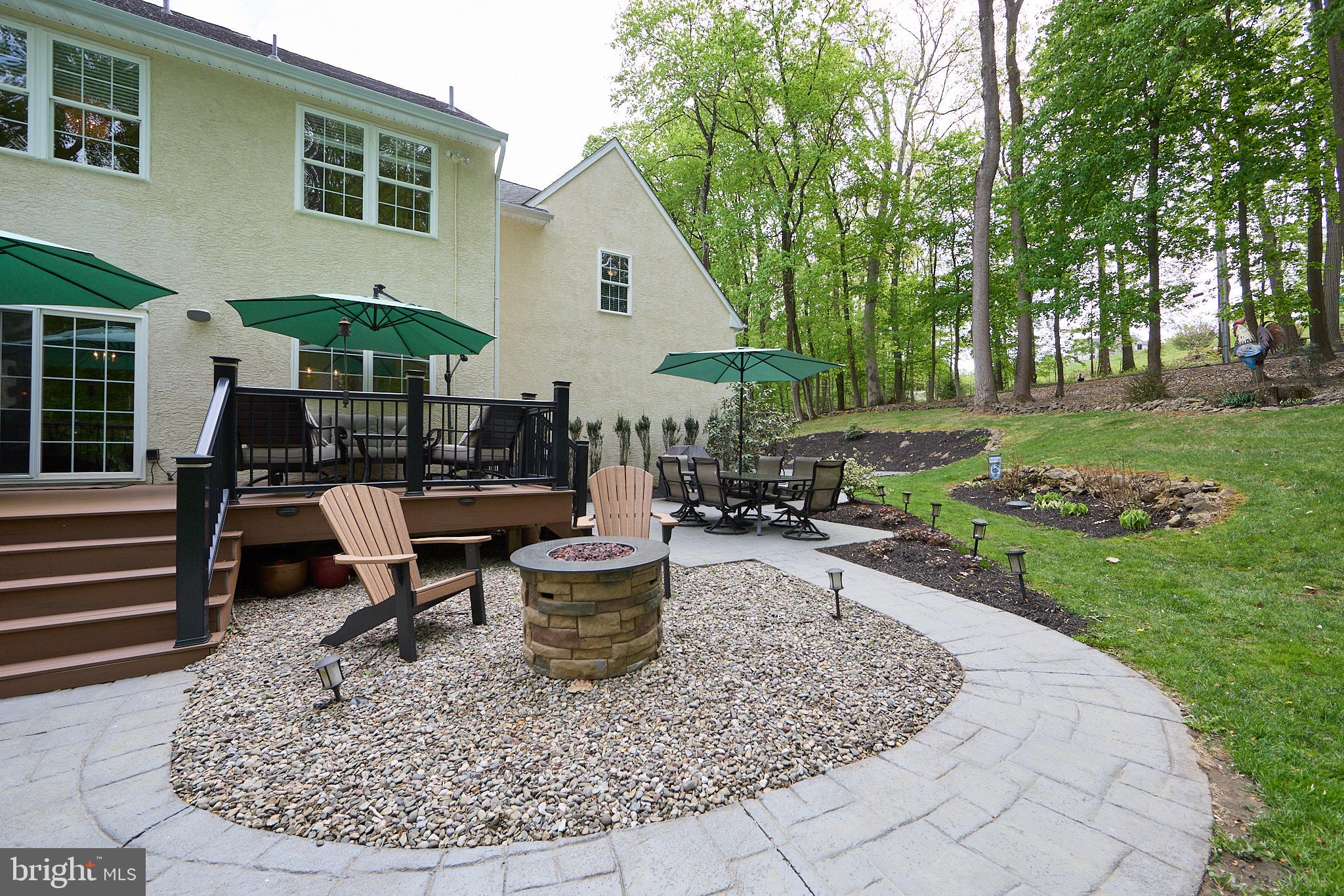 661 St Matthews Road Chester Springs, PA 19425 - Photo 59 of 64 Serene backyard retreat with fire pit.