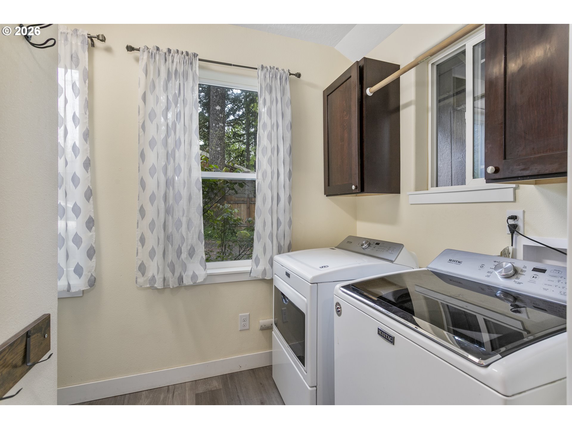 23575 East Gumjuwac Road Welches, OR 97067 - Photo 16 of 48 a kitchen that has a sink a stove and a refrigerator
