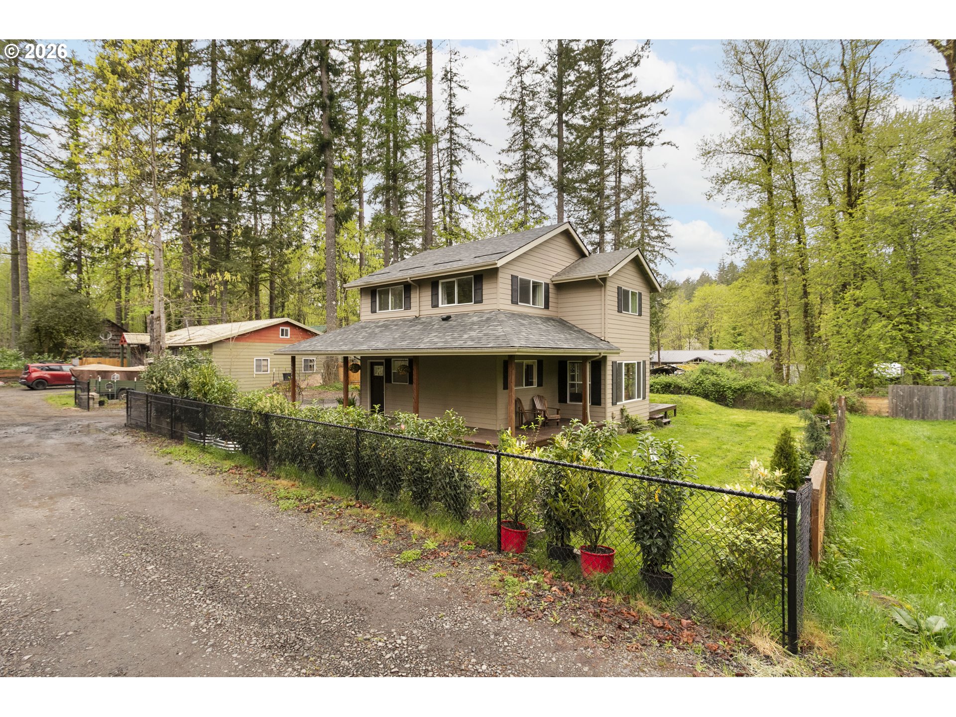 23575 East Gumjuwac Road Welches, OR 97067 - Photo 2 of 48 a view of a house with a yard