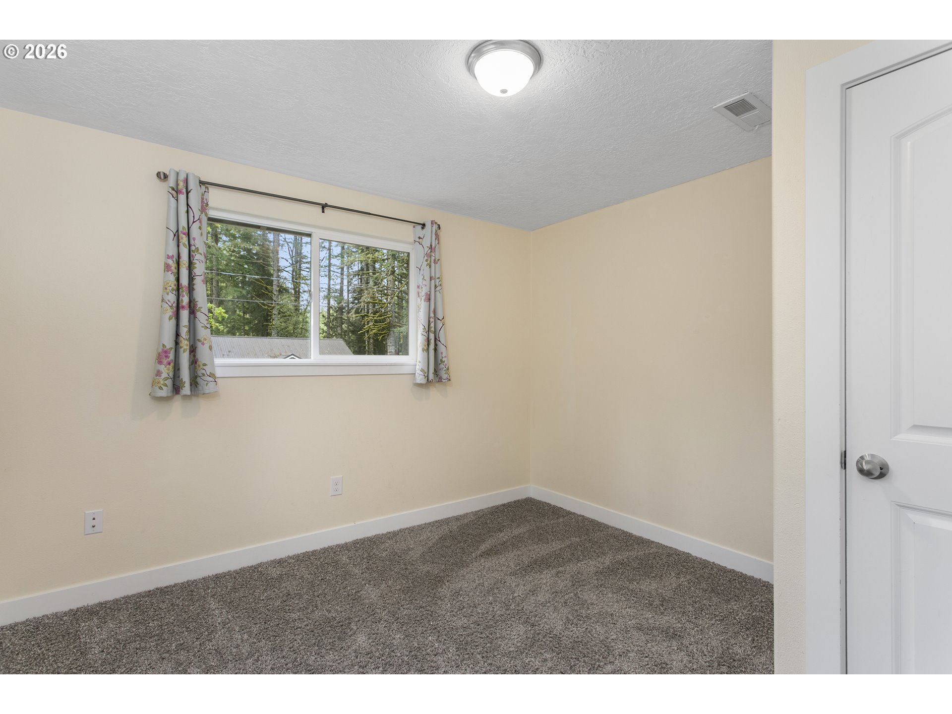 23575 East Gumjuwac Road Welches, OR 97067 - Photo 21 of 48 view of an empty room with a window