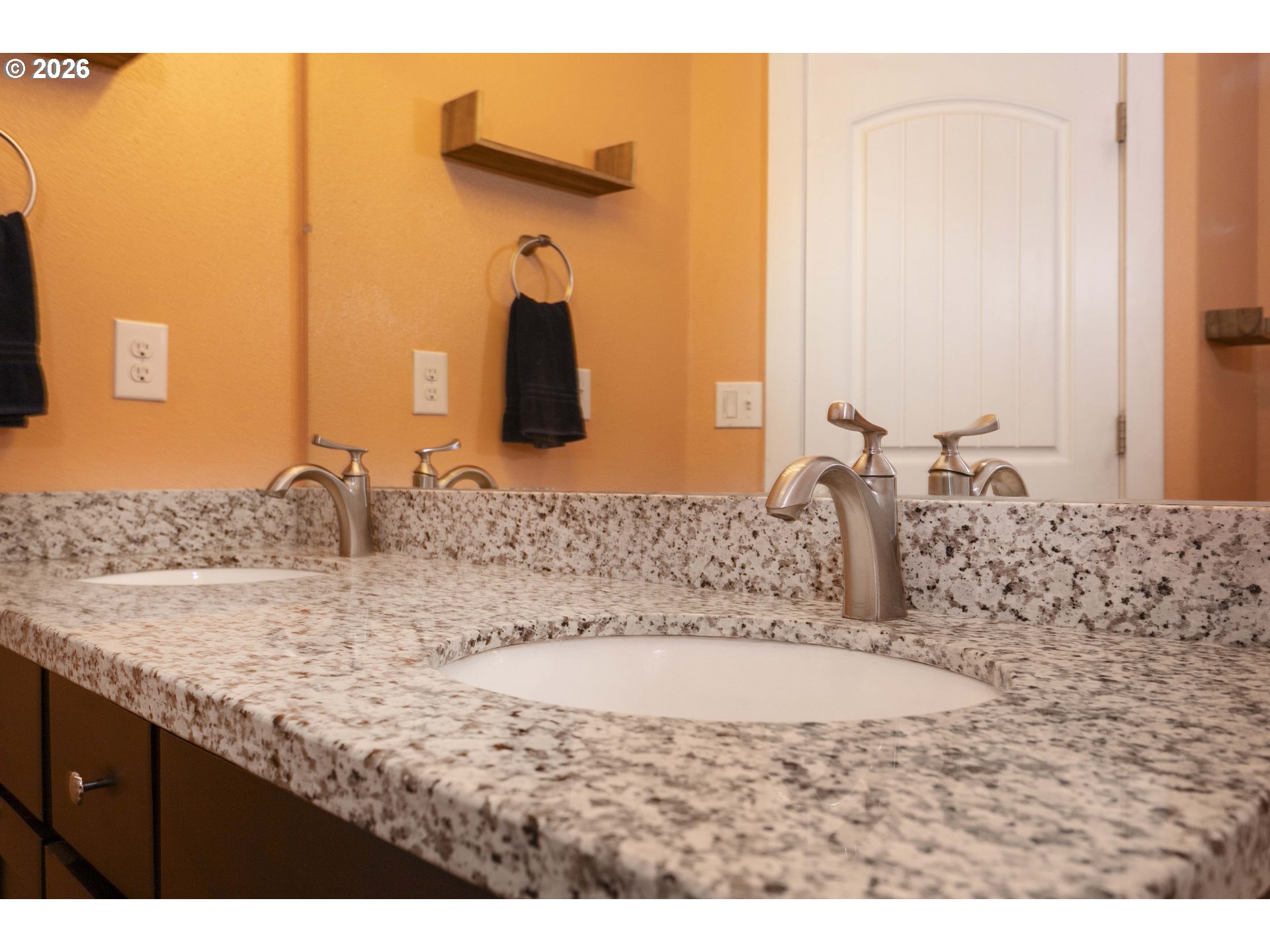 23575 East Gumjuwac Road Welches, OR 97067 - Photo 27 of 48 a bathroom with a granite countertop sink and a mirror