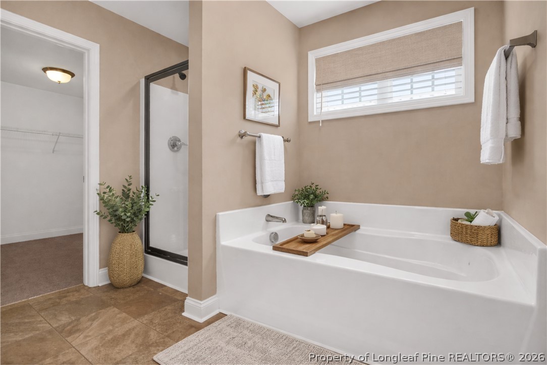 448 Pittfield Run Cameron, NC 28326 - Photo 34 of 43 a bathroom with a tub and a sink