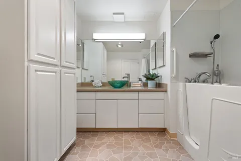 a bathroom with a sink and a mirror