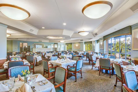 a group of people sitting at living room