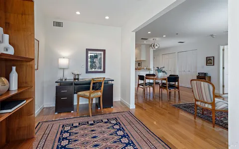 a view of a dining room with furniture