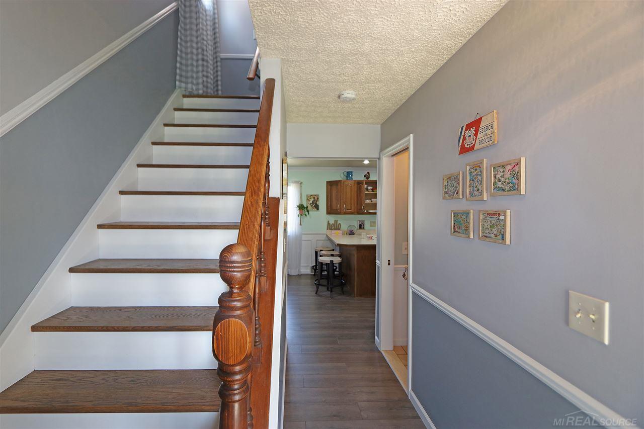 23325 Rochelle Street Macomb, MI 48042 - Photo 6 of 67 Walking in through the front door.