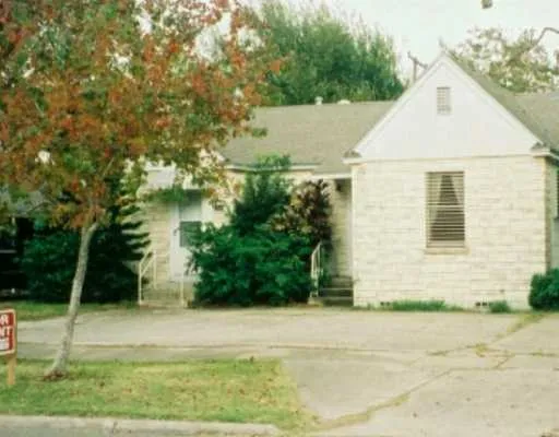 a view of front door and yard