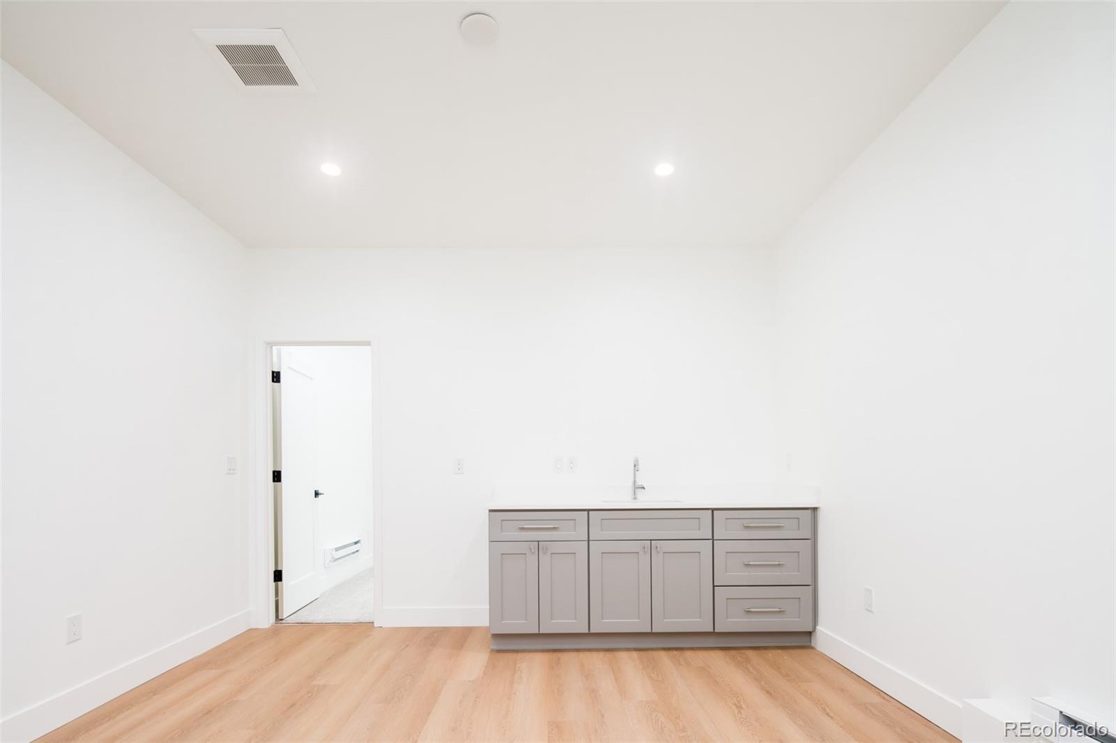 263 South Jackson Street Denver, CO 80209 - Photo 27 of 35 a view of a room with wooden floor