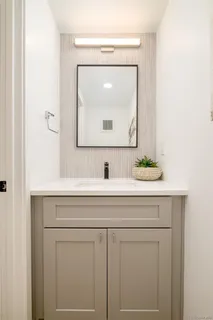 a sink with a mirror