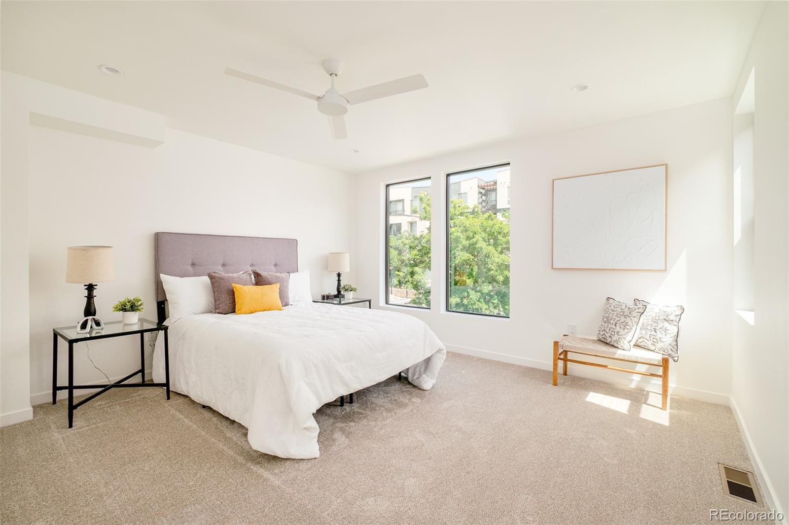 263 South Jackson Street Denver, CO 80209 - Photo 10 of 35 a bedroom with a bed and window