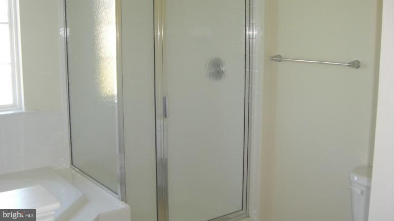 1934 Waltman Road Edgewood, MD 21040 - Photo 16 of 17 a bathroom with a glass shower door