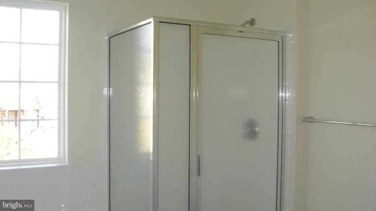 1934 Waltman Road Edgewood, MD 21040 - Photo 4 of 17 a bathroom with a glass shower door