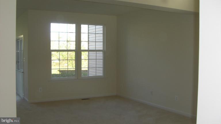 1934 Waltman Road Edgewood, MD 21040 - Photo 6 of 17 an empty room with a window