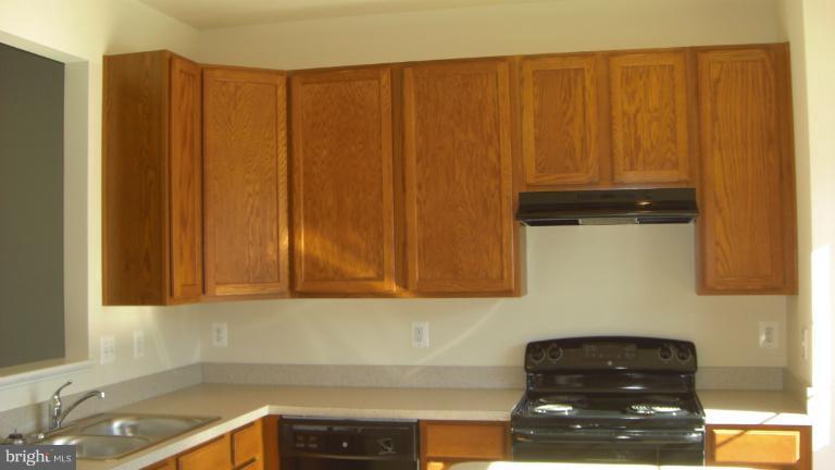 1934 Waltman Road Edgewood, MD 21040 - Photo 9 of 17 a kitchen with a sink and cabinets