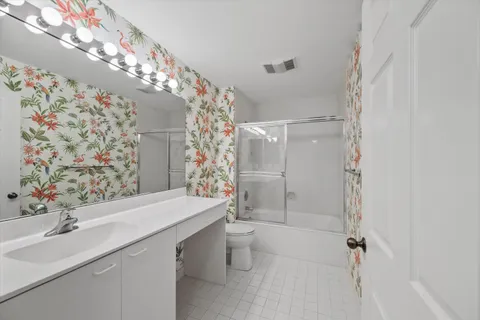 a view of a livingroom and wooden floor