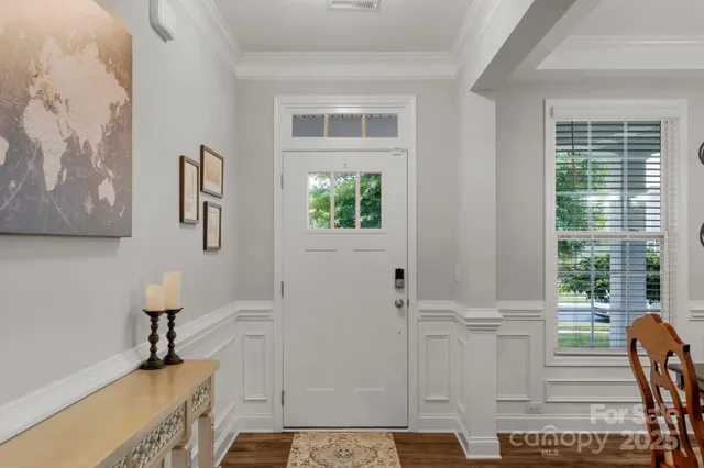 a bathroom with a tub and a window