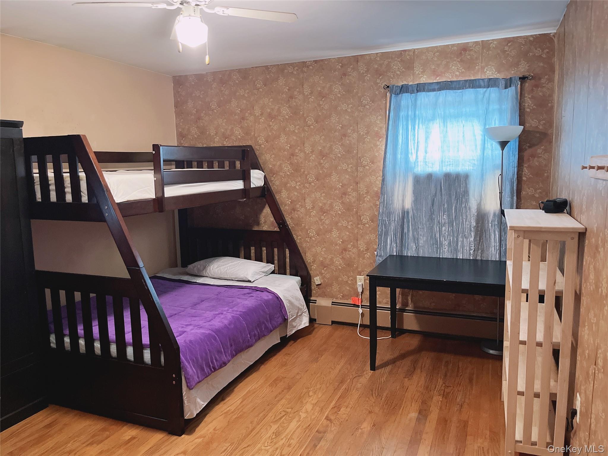 225 Monhagen Avenue Middletown, NY 10940 - Photo 12 of 19 a bedroom with furniture and a window