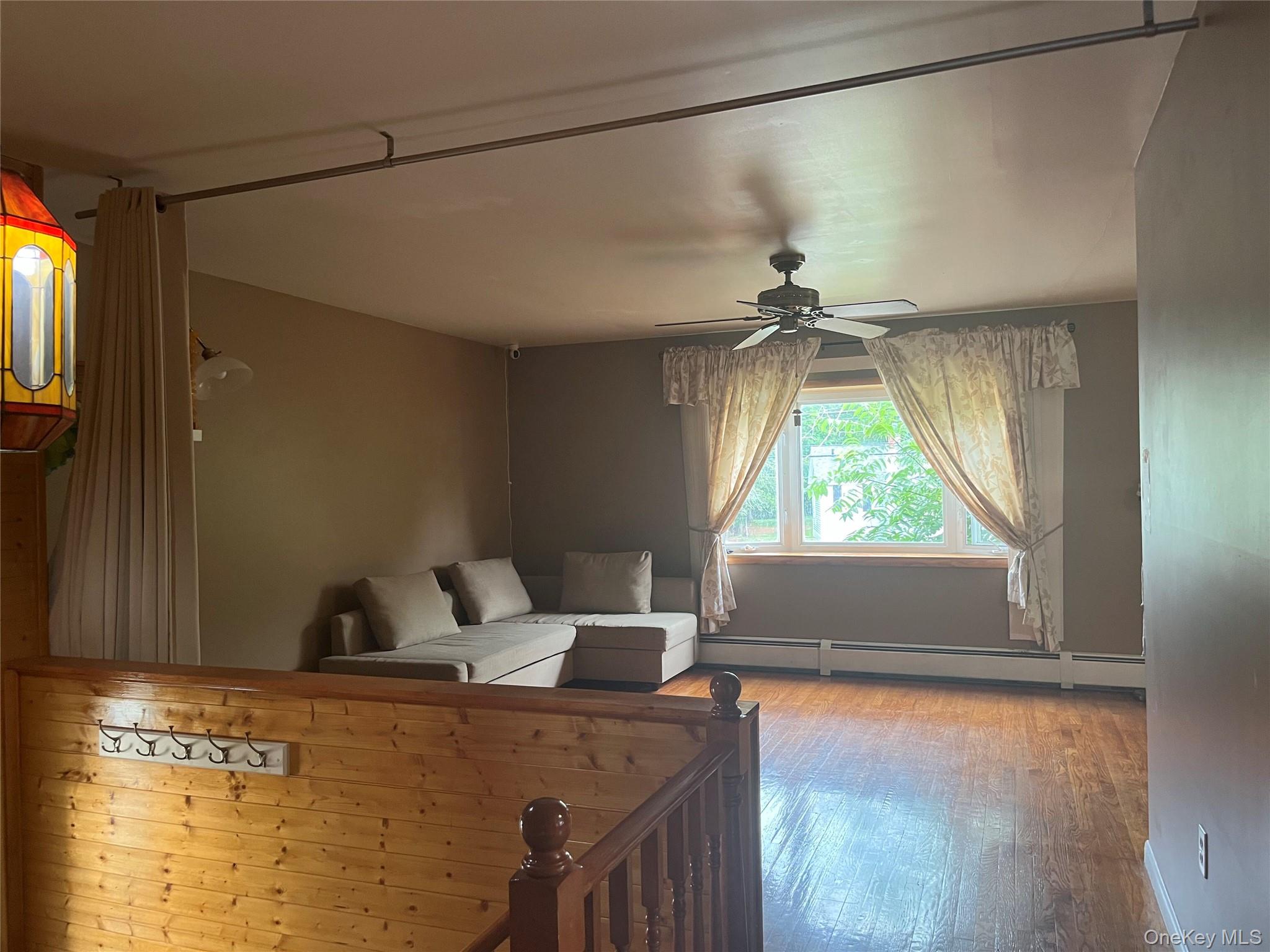 225 Monhagen Avenue Middletown, NY 10940 - Photo 14 of 19 a living room with a window