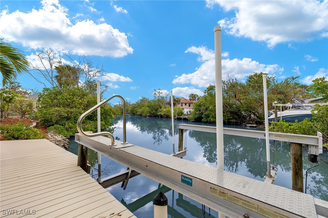 5869 Pine Tree Drive Sanibel, FL 33957 - Photo 5 of 30 a view of a lake from a balcony