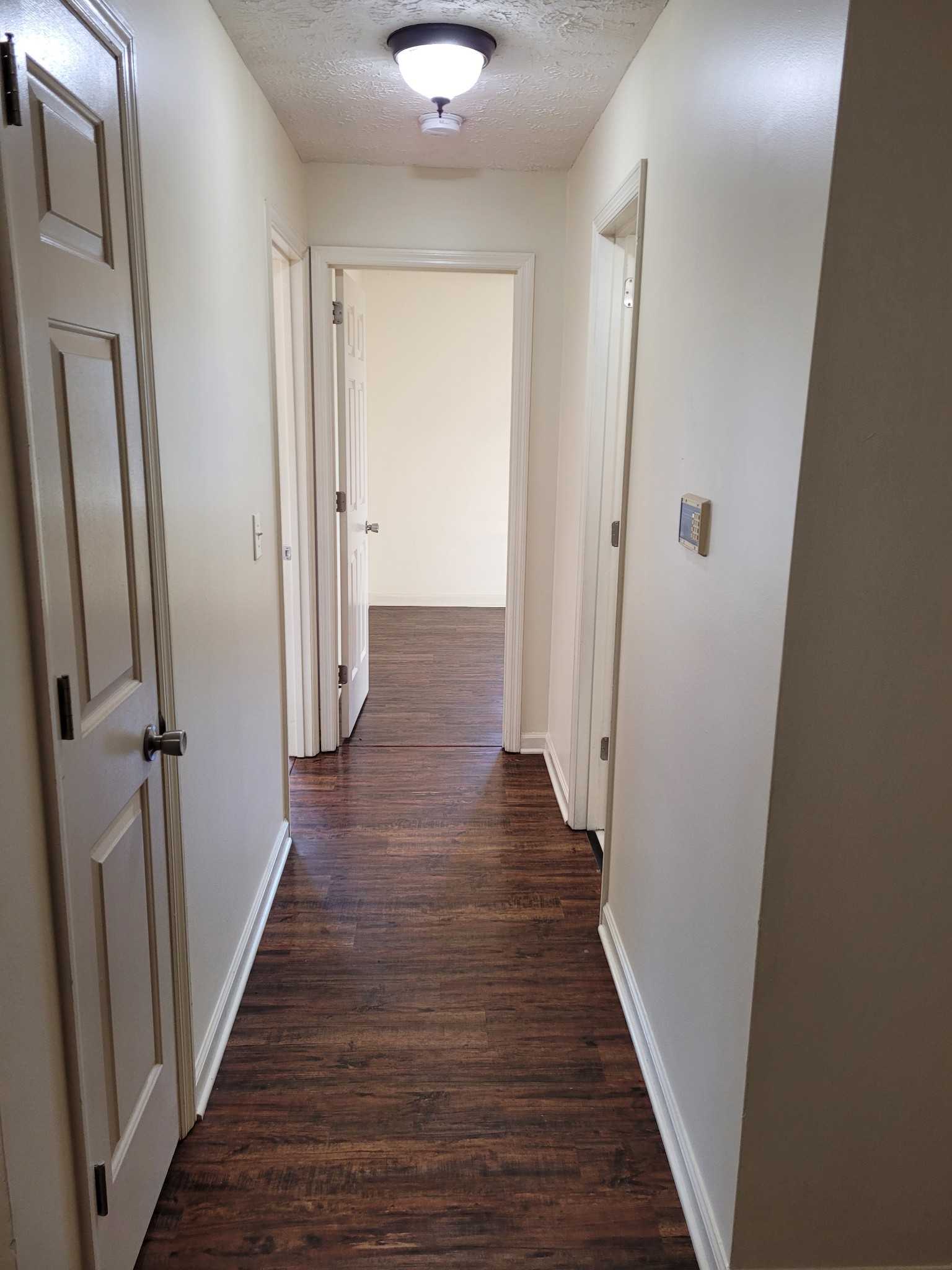 1808 State Street, Unit 307 Nashville, TN 37203 - Photo 5 of 8 a view of a hallway with wooden floor