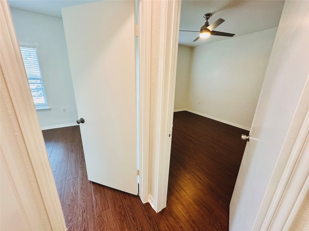 6301 Crumley Lane Austin, TX 78741 - Photo 30 of 39 a view of a hallway with wooden floor