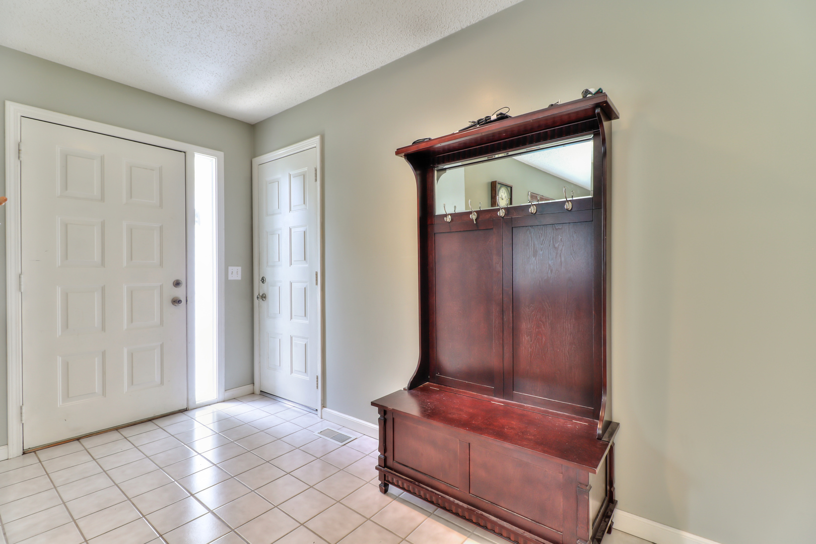 3202 Sharon Drive Champaign, IL 61822 - Photo 11 of 37 an empty room with mirror and a wooden floor